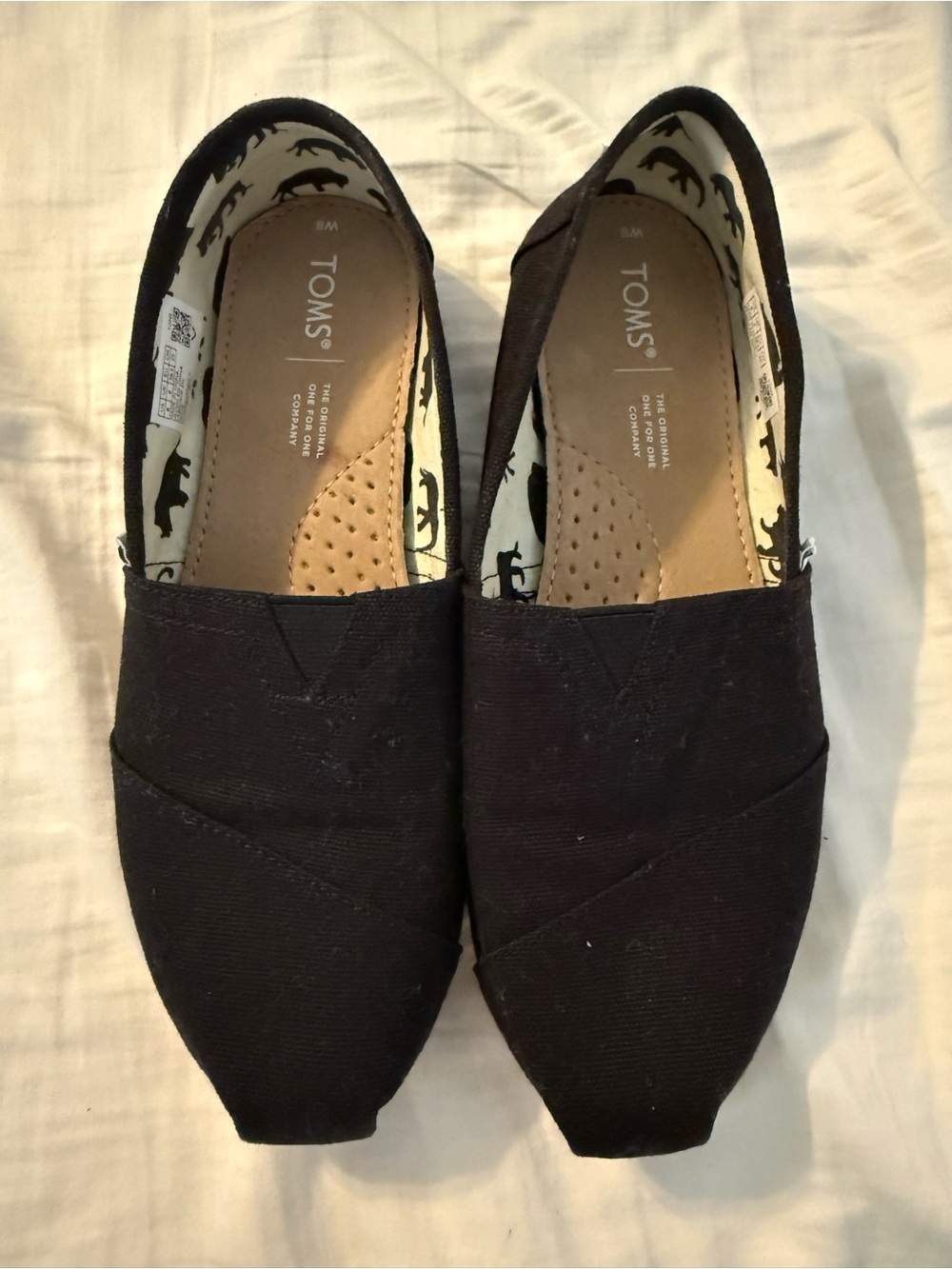 Toms Women's Classic Slip-On Flats in Black Canvas